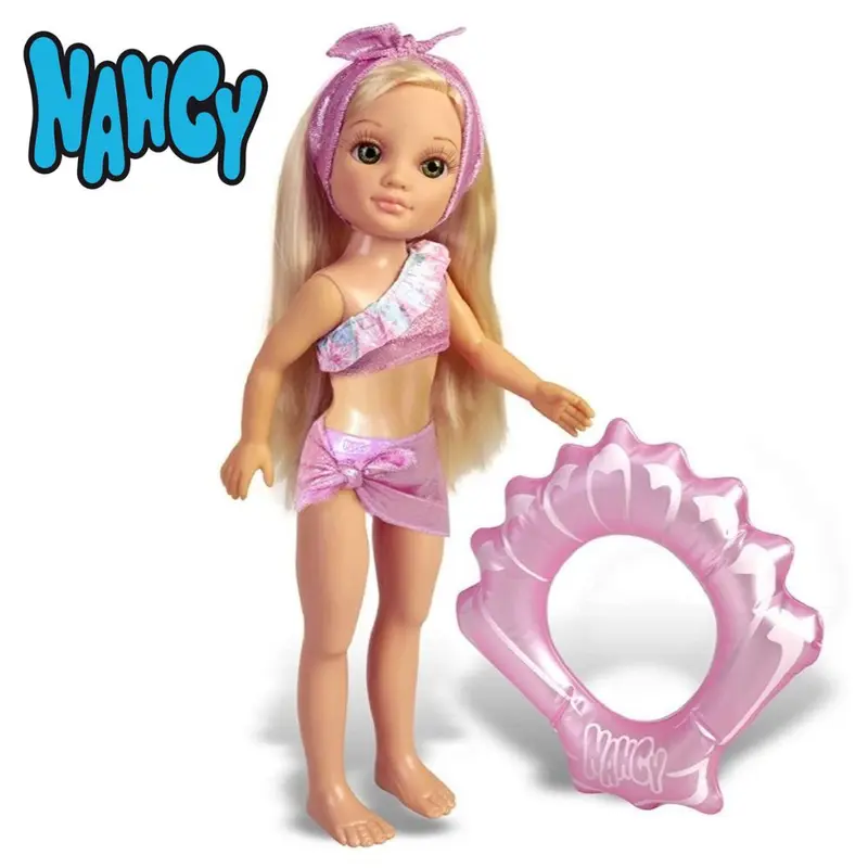 Nancy un dia de verano muñeca rubia con flotador rosa de concha