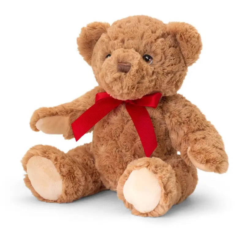 Oso de peluche con lazo rojo