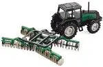 Tractor Valtra 6850 con grada de discos 1